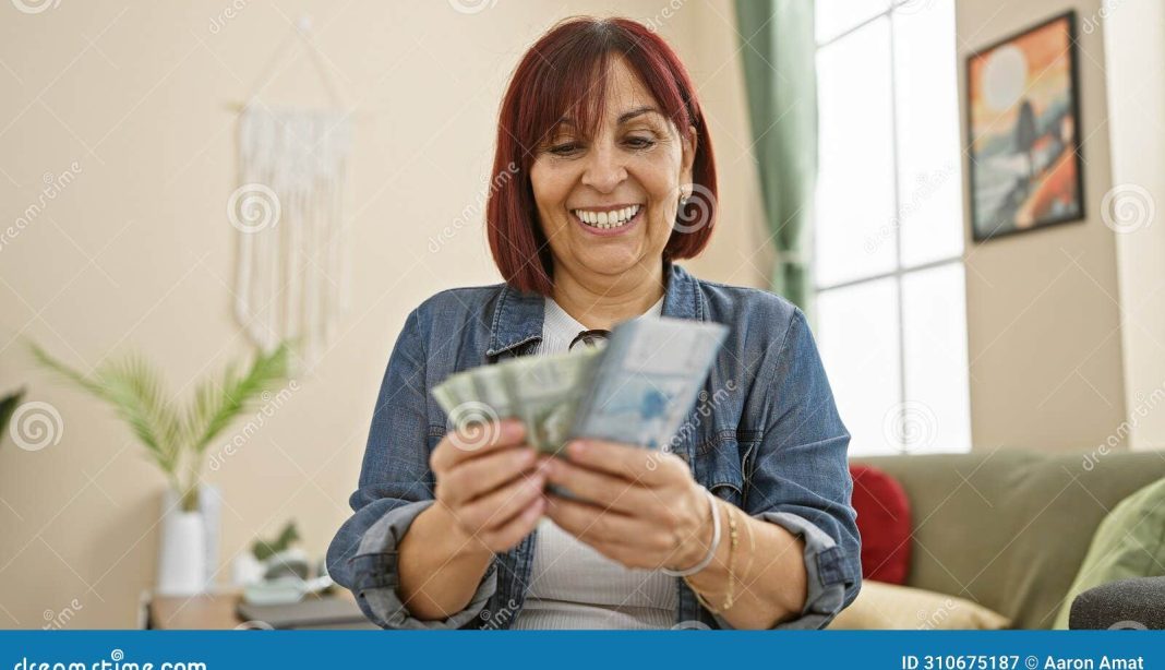 Hispanic woman counting money